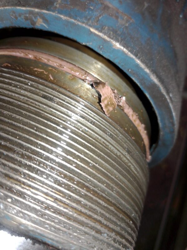 Close-up of damaged cylinder thread and seal found during strip-down