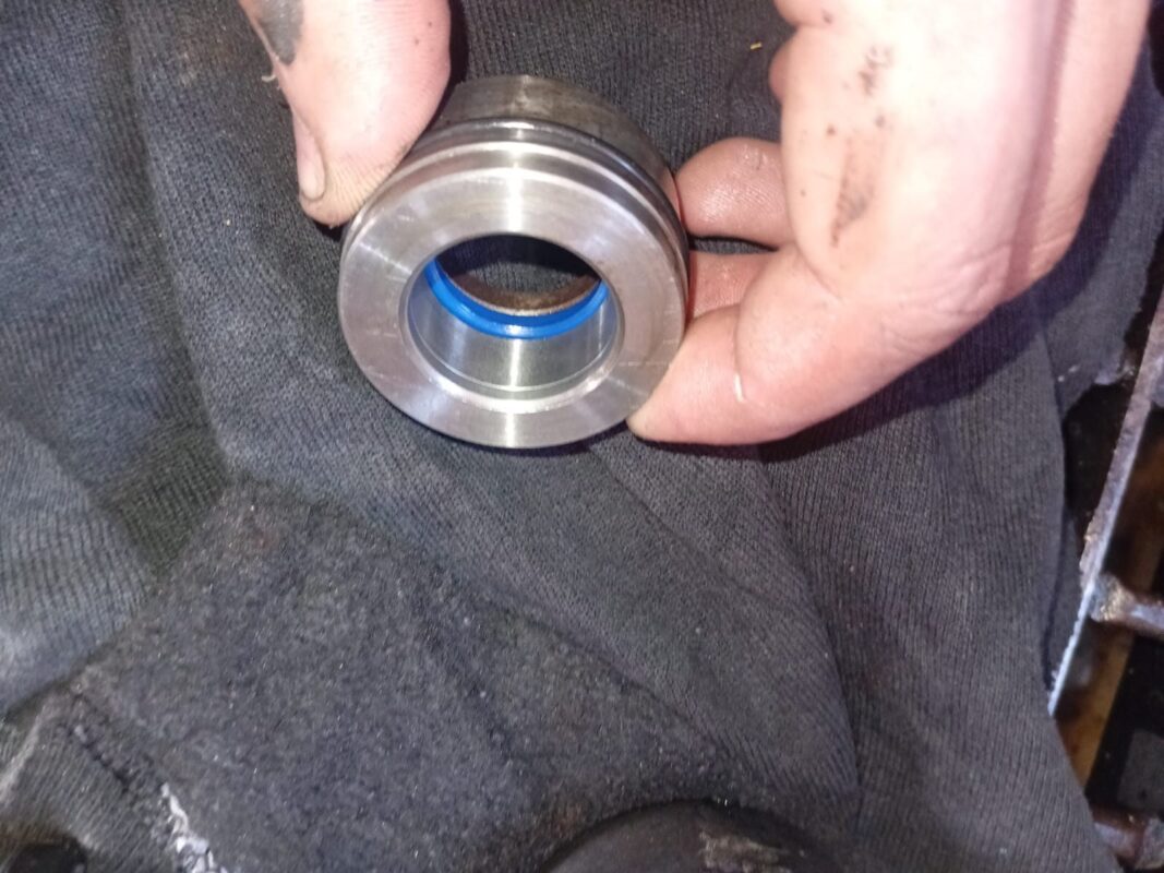 Hydraulic cylinder gland fitted with new seals during a reseal