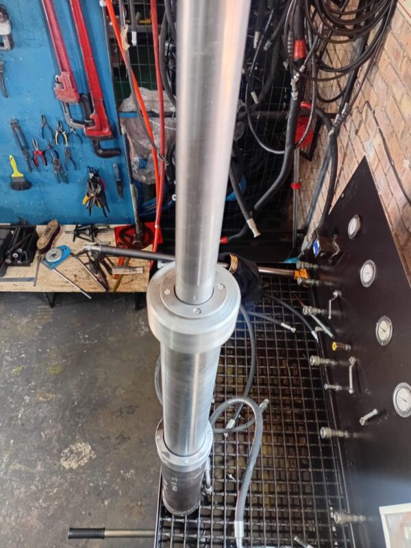 Rebuilt hydraulic cylinder being pressure tested on the test bench