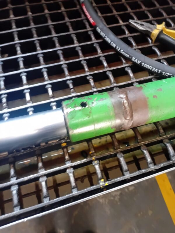 Hydraulic cylinder rod and barrel during repair