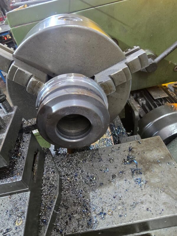 Hydraulic cylinder gland being machined in-house on the lathe