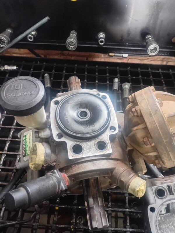 Hydraulic pump components cleaned and inspected during a rebuild