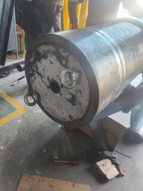 Piston accumulator barrel assembled with lifting eye bolts